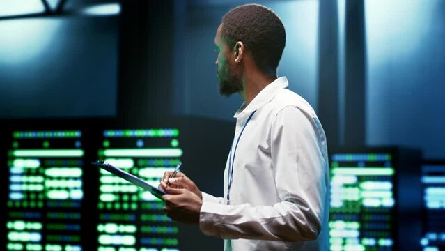 Expert preventing server cybersecurity issues arising due to outdated software and unsecured network connections. Technician protecting data center vulnerable to attacks and other security incidents