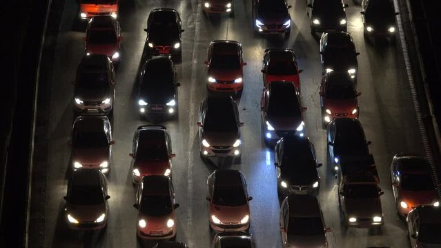 Tehran, Iran- December 19, 2022: impressive picture of evening Heavy traffic, congestion. Car lights break the darkness