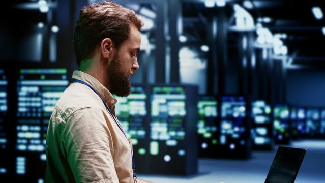 Engineer servicing server clusters with high computing power enabling hyperscale data center to support demanding applications, including artificial intelligence and machine learning workloads