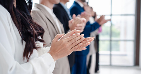 People group in meeting room conference team clapping hands for success and supporting presentation to speaker. Business meeting and seminar concept.