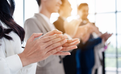 People group in meeting room conference team clapping hands for success and supporting presentation...
