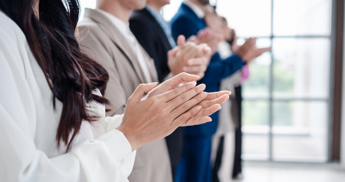 People group in meeting room conference team clapping hands for success and supporting presentation to speaker. Business meeting and seminar concept.
