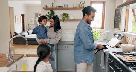Cooking, high five and happy with family in kitchen for food, baking and support. Cookies, success and celebration with parents and children and oven at home for helping, motivation and love