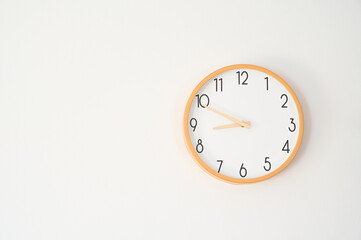 Wall Clock at 9 O'clock, Symbolizing Punctuality and Time Management