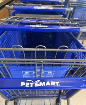 Spokane, WA - USA -July 7, 2023 - Group of shopping carts for PetSmart are lined up outside the store