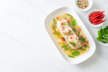 steamed sea bass fish with herbs