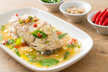 steamed sea bass fish with herbs