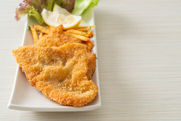 fish and chips - fried fish fillet with potatoes chips