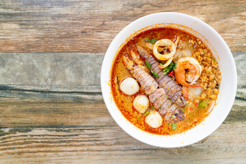 spicy seafood noodles bowl in Thai style