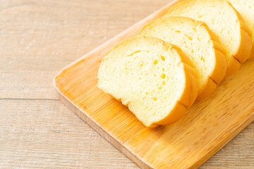 potatoes bread sliced on wood board