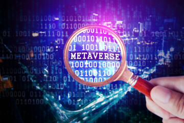 Close up of Binary codes on screen and METAVERSE word