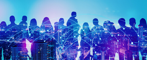 The double exposure image of the people overlay with cityscape image and futuristic hologram. modern life, business, city life and internet of things.