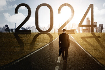 Image of male entrepreneur walking on the road with numbers 2024 new year
