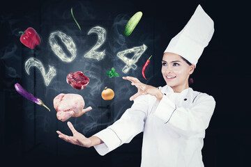 Indian female magician chef with flying food ingredients and smoke shaped of 2024 new year numbers - obrazy, fototapety, plakaty