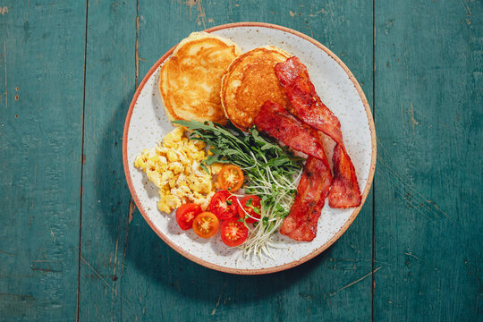 Breakfast Pancakes with Bacon and Scrambled Eggs