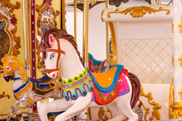 Fototapeta na wymiar Graceful Elegance: Exquisite Detail of a White Carousel Horse