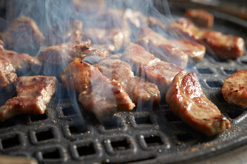 Grilled Pork Shoulder on the grill 
