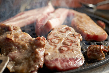 Grilled Pork Shoulder on the grill	