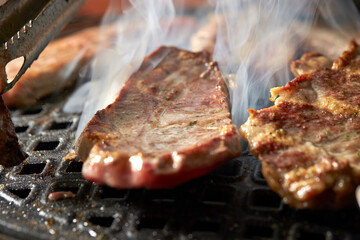 Grilled Pork Shoulder on the grill	