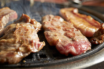 Grilled Pork Shoulder on the grill	