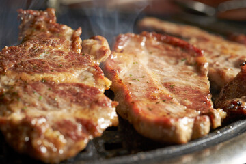 Grilled Pork Shoulder on the grill	