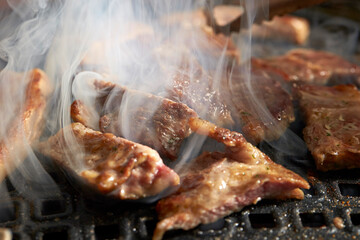 Grilled Pork Shoulder on the grill	