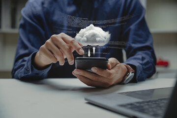 Computer system resources and data storage, Cloud service technologies concept, Businessman holding smart phone with cloud computing icon.