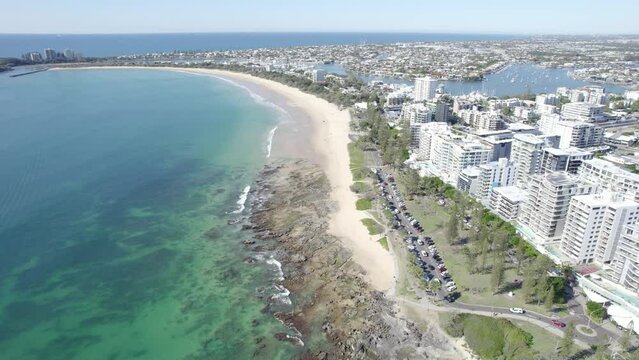 Golden Sand of Mooloolaba Beach, Maroochydore in the Sunshine Coast region of Queensland, Australia. aerial forward