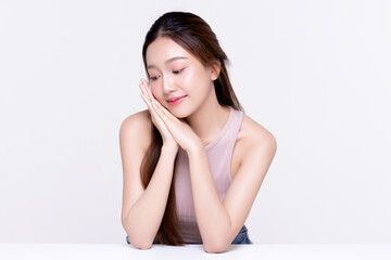 Obraz na płótnie Canvas Beautiful young Asian woman with healthy and perfect skin on isolated white background. Facial and skin care concept for commercial advertising.