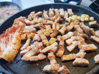 Pork belly on iron plate