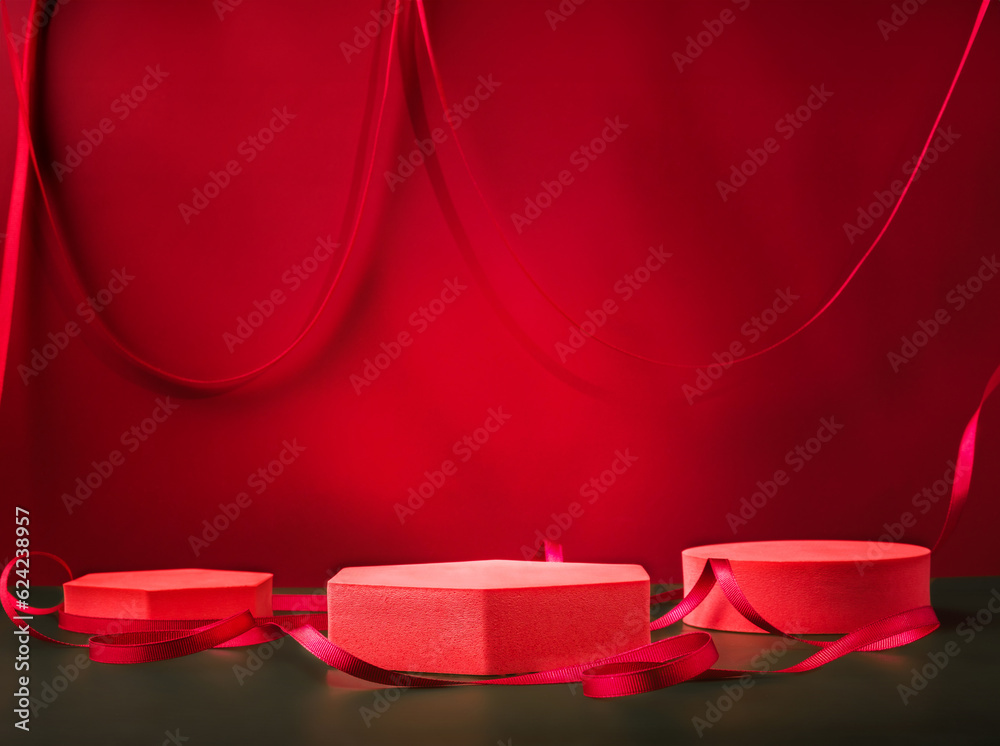Aufkleber red pedestal product display and ribbon on red and dark green background with modern geometric block