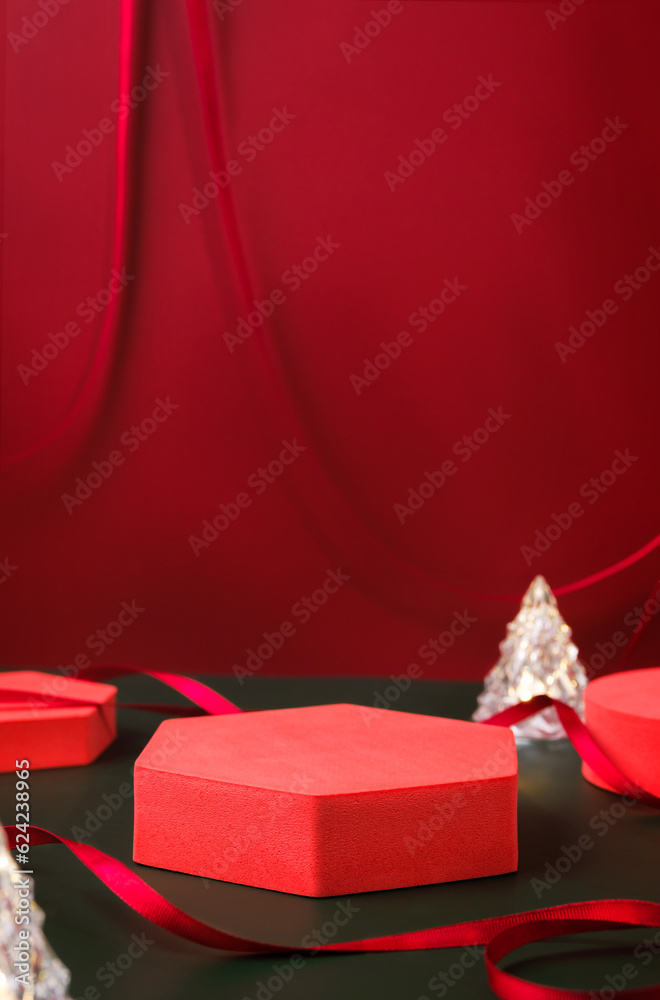 Aufkleber red pedestal product display and ribbon on red and dark green background with modern geometric block