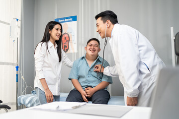 Asian young man and mother visit and consult health problem with doctor. 