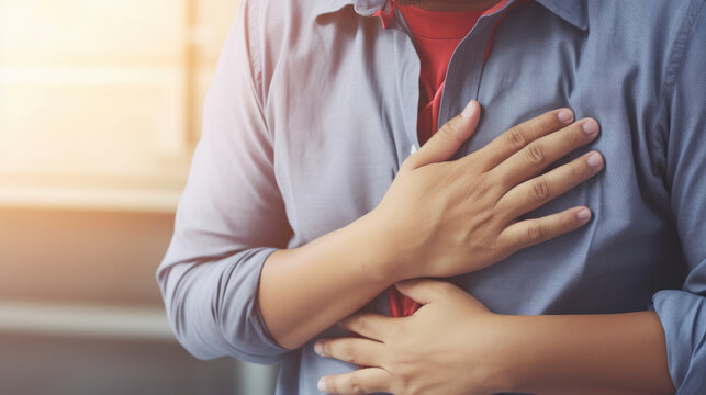 Hands holding chest with symptom heart attack disease
