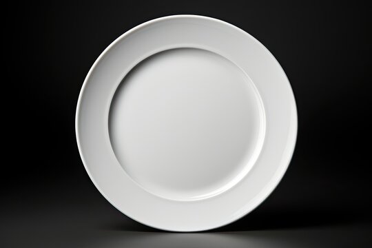 White plate on black background