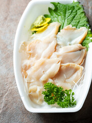whelk Sashimi on a plate