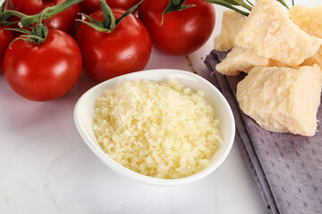 Shredded Italian hard parmesan cheese