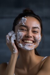Woman washing face with facial soap