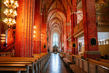 Fototapeta na wymiar Red brick interior of a church in Stockholm Sweden