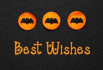 Black Halloween Background With Orange Dots And Text Best Wishes
