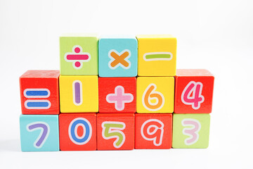 Number wood block cubes for learning Mathematic, education math concept.