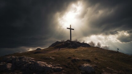 Holy cross symbolizing the death and resurrection of Jesus Christ with the sky over Golgotha Hill is shrouded in light and clouds. Apocalypse concept.
