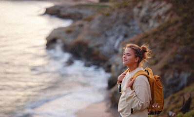 Travel and active lifestyle concept. Happy smiling woman hiking in mountains , Fethie, Turkey....