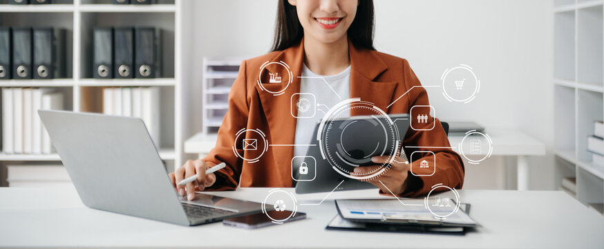 Digital marketing media in virtual screen.business working digital tablet, smartphone with computer laptop at office in morning light.
