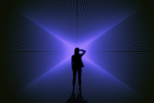 Conceptual image of businesswoman silhouette on bright blue lines background. Success, metaverse and direction concept.