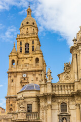 Tower and blue roof tiles on the cathedral of Murcia, Spain