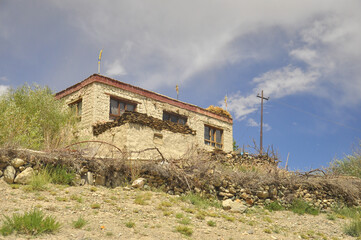 Low angle view of a old Ladakhi traditional house with sky view in Padum, Zanskar Valley, Ladakh, INDIA 