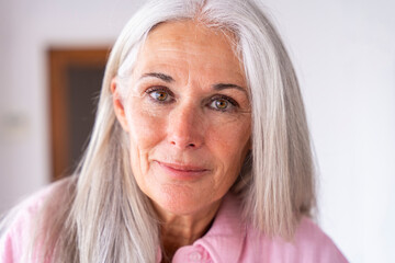 Smiling mature woman with gray hair