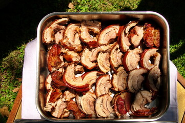 Above shot of pork meat baked on skewer and cut in pieces