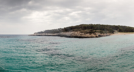 a small bay on the coastline of spain